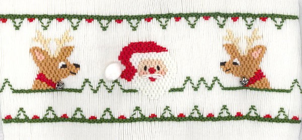 Smocking plate with Santa and two reindeer on either side along with geometric designs. 8 rows of smocking on a yoke.