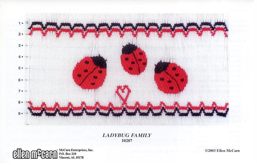 Smocking plate with three ladybugs and a heart. 9 rows of smocking