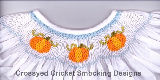 Smocked collar with pumpkin design and 'Crossyed Cricket Smocking Designs' text.