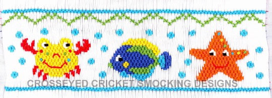 Smocking plate with three fun sea creatures: a crab, starfish and a fish! 7 rows of smocking on a yoke.