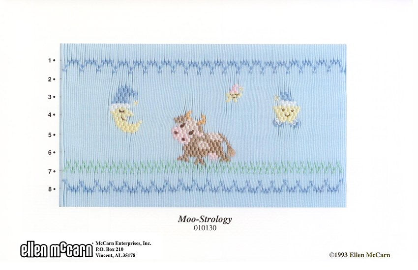Smocking design with a cow and moon design on a blue background, featuring the brand 'Ellen McCarn'.