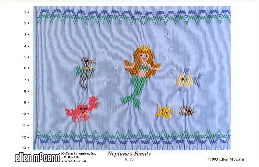 Smocking plate with a mermaid, a crab, seahorse, fish, and starfish. 13 rows of smocking
