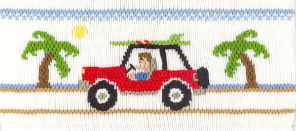 Smocking plate with a man in a jeep with a surf board on the roof with palm trees on a beach. 8 rows of smocking on a yoke.