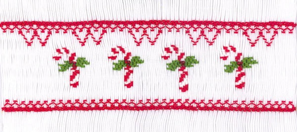 Smocking plate with candy canes and holly. 7 rows of smocking on a yoke.