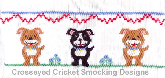Darling puppies line up along 7 1/2 rows of smocking on a yoke.