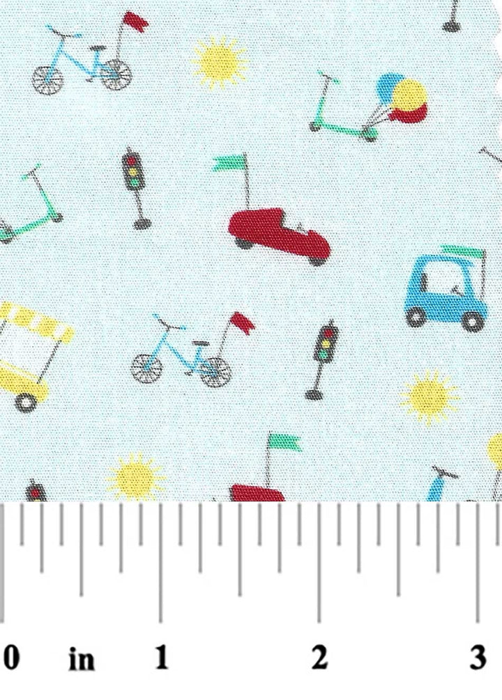 Fabric with small vehicle illustrations on a light blue background, featuring bicycles, cars, and traffic lights.