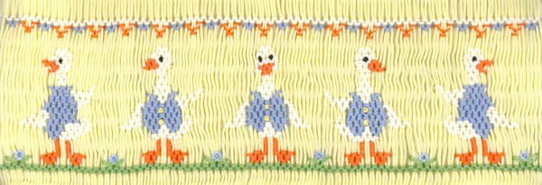 Smocking plate with ducks in a row dressed in vests. 7 rows of smocking on a yoke.