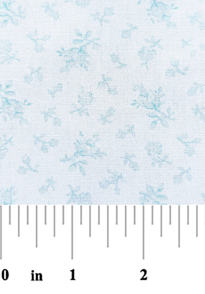 soft blue flora print on a white background with a ruler at bottom for scale