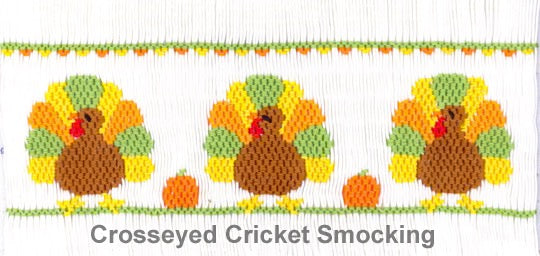 Smocking plate three turkeys and two pumpkins. 7 1/2 rows of smocking on a yoke.
