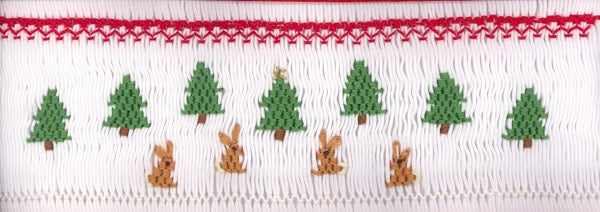 Pattern of Christmas trees and reindeer on a white background with red border