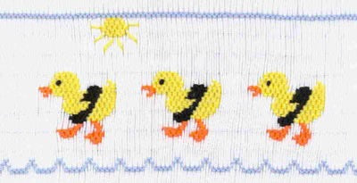 Smocking plate with three ducklings. 9 rows of smocking on a yoke.