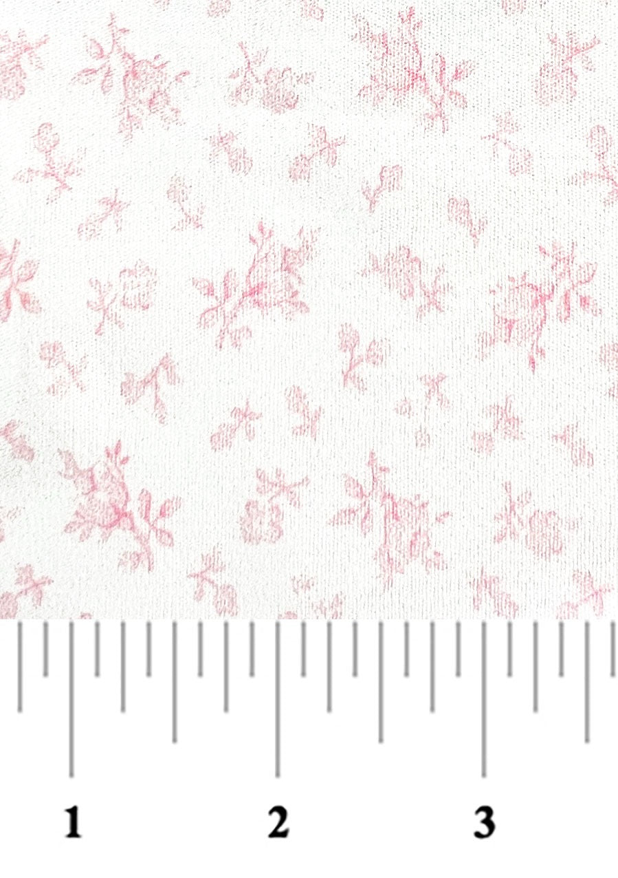 soft pink floral on a white background with a ruler at bottom for scale