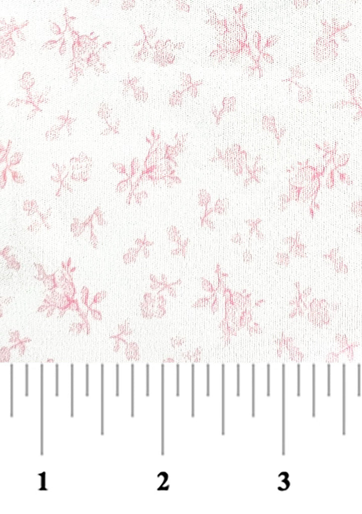soft pink floral on a white background with a ruler at bottom for scale