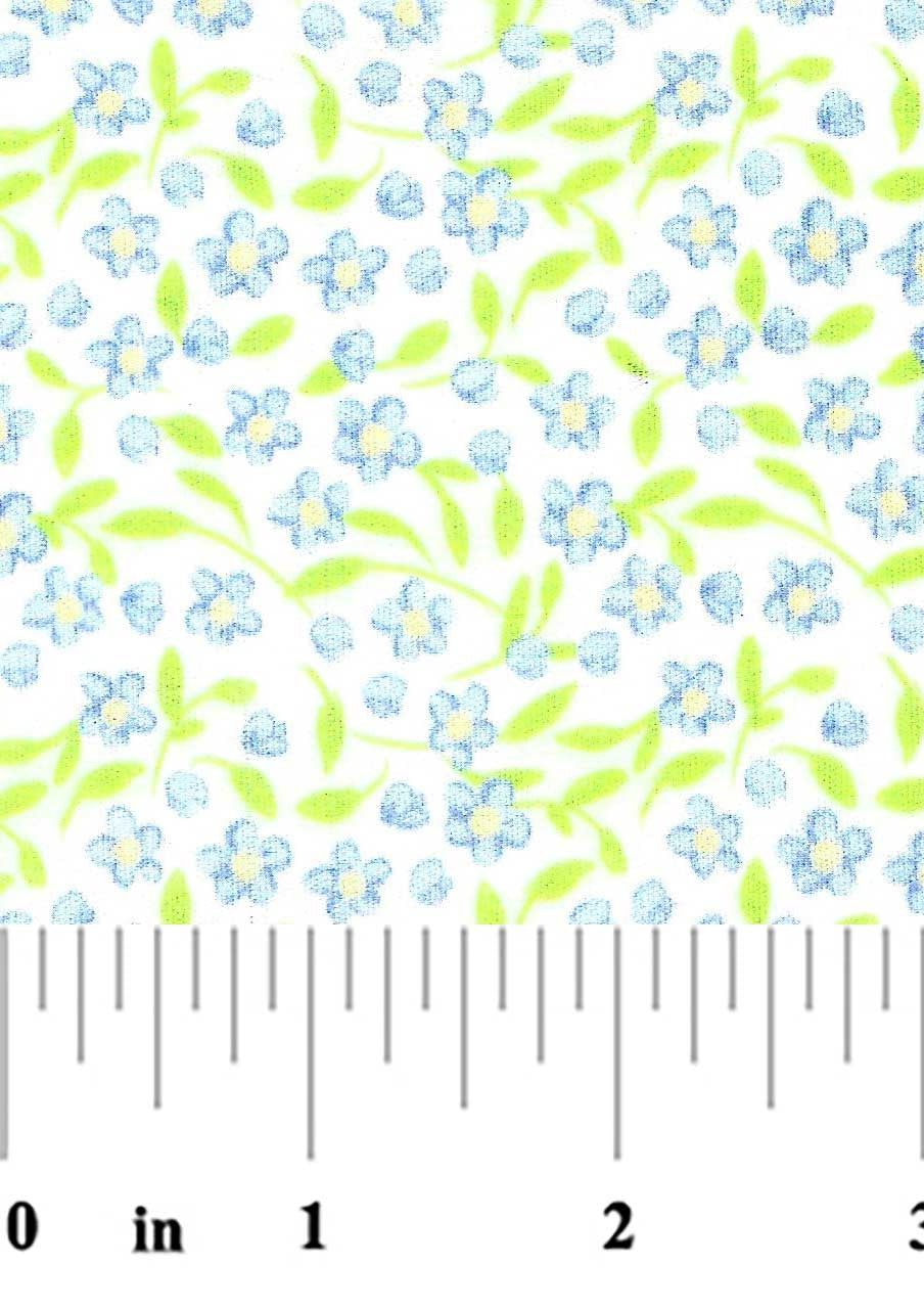 Floral pattern with blue flowers and green leaves on a white background, measured by a ruler.