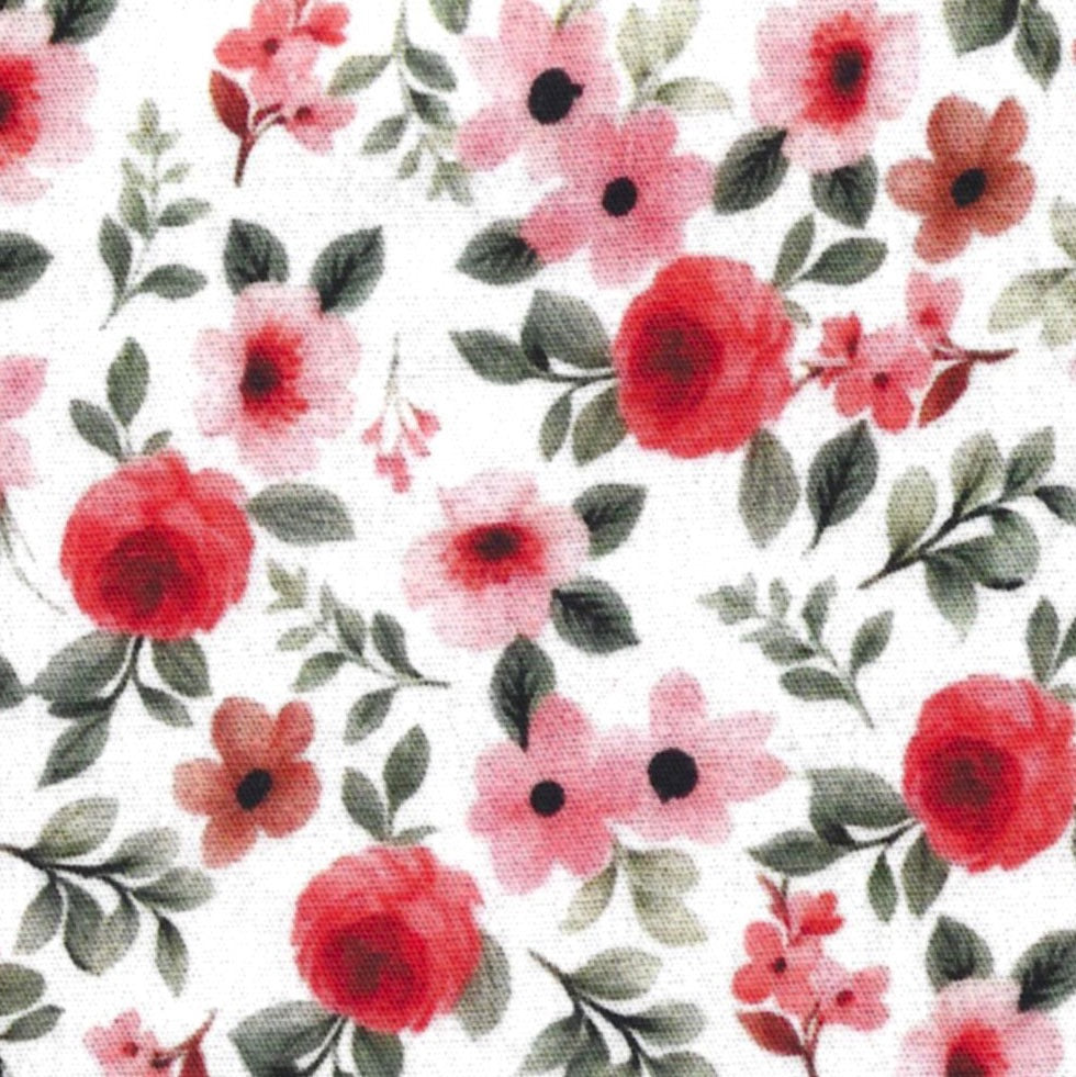 red, pink, and green floral print on a solid white background. 
