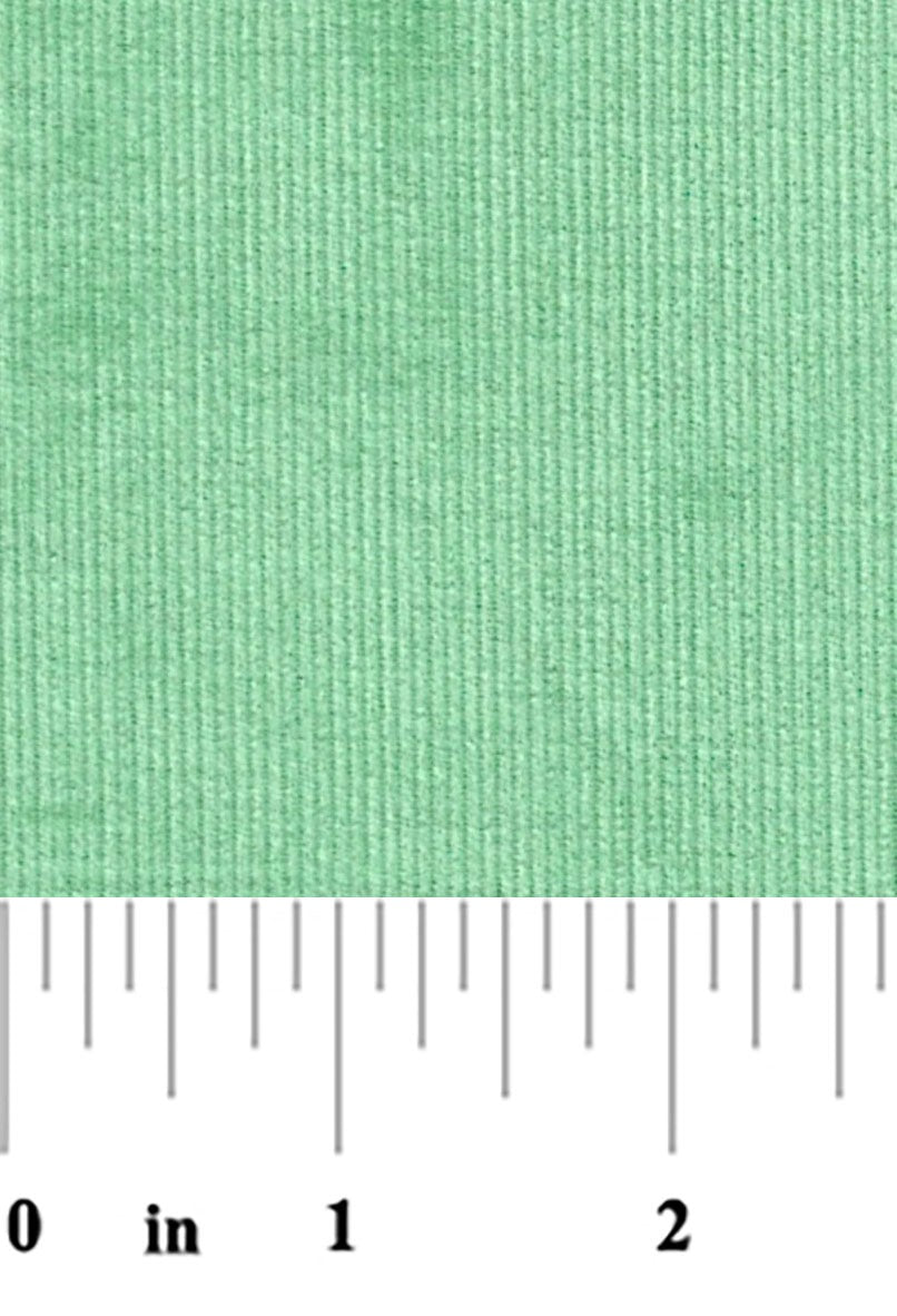 fabric swatch of chive color 21 wale corduroy fabric with a ruler at the bottom for scale