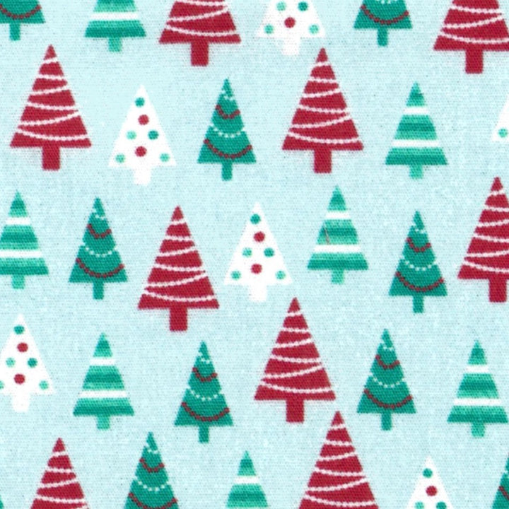 fabric swatch of red and green Christmas Trees on a light blue background.