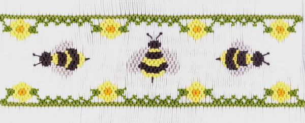 Smocking plate with bumble bees facing different directions. 7 rows of smocking on a yoke. Requires 164 pleats.