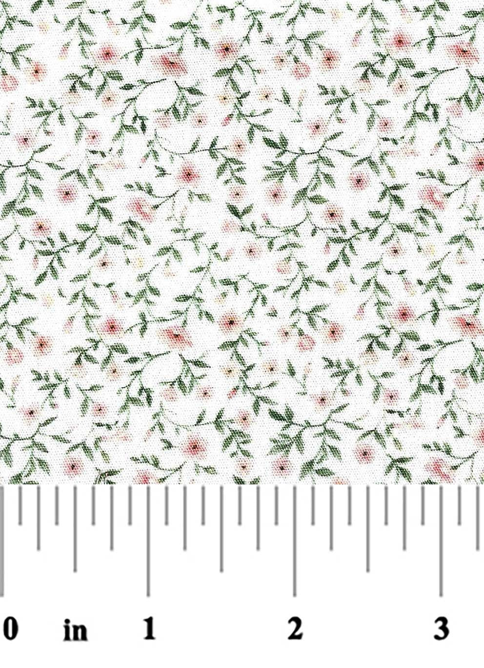 fabric swatch of a pink and green floral on a white background with a ruler at the bottom for scale
