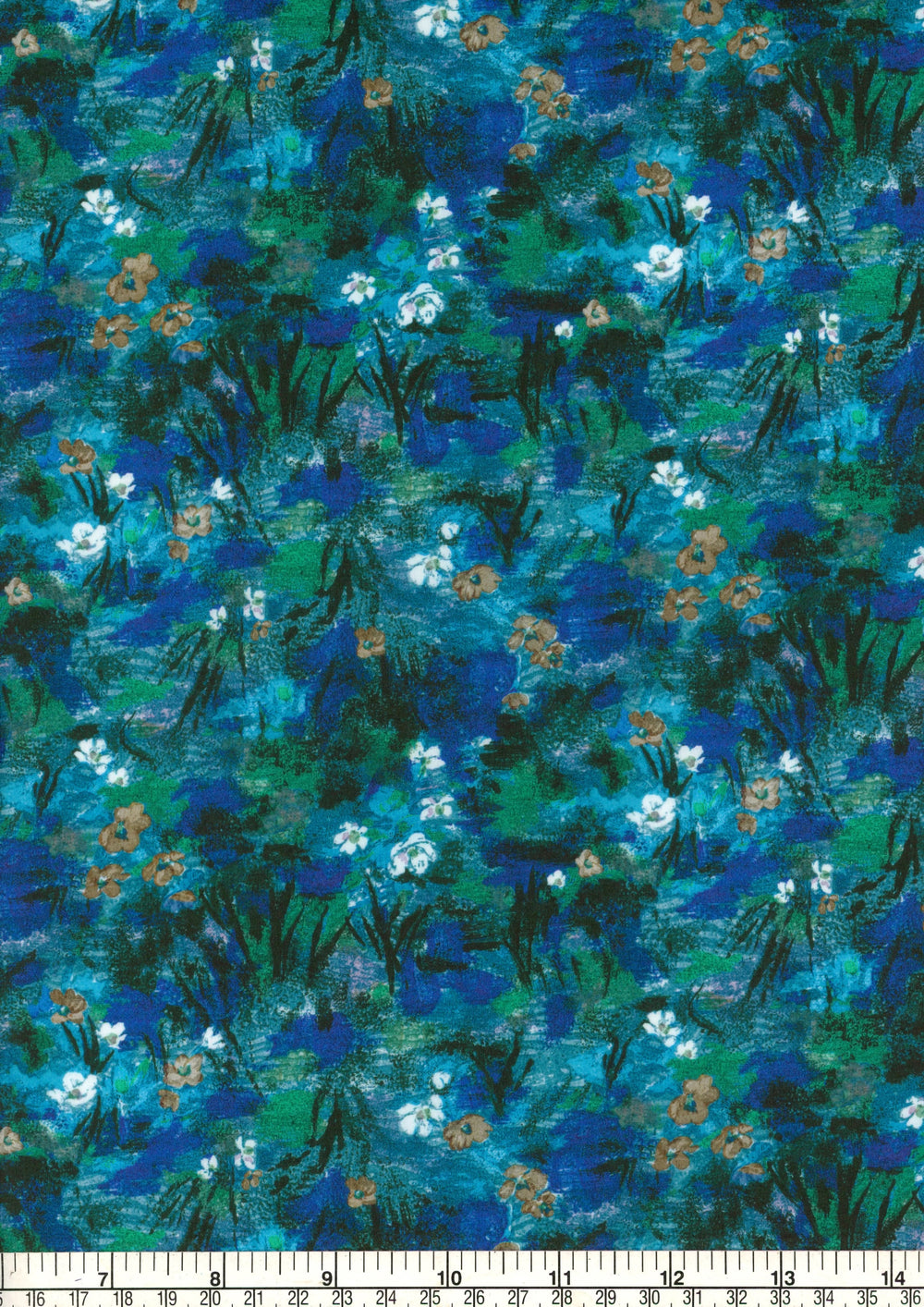 Fabric with a floral pattern in blue, green, and white on a ruler for scale.