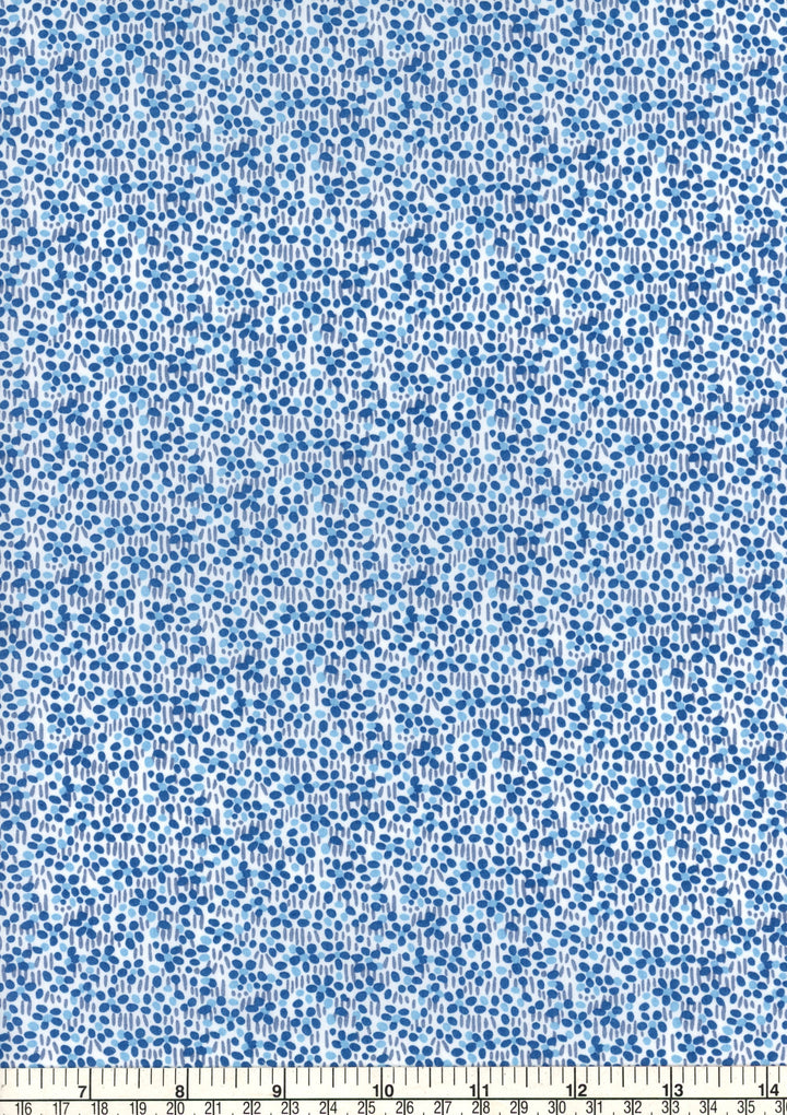Blue and white floral pattern fabric with a ruler at the bottom