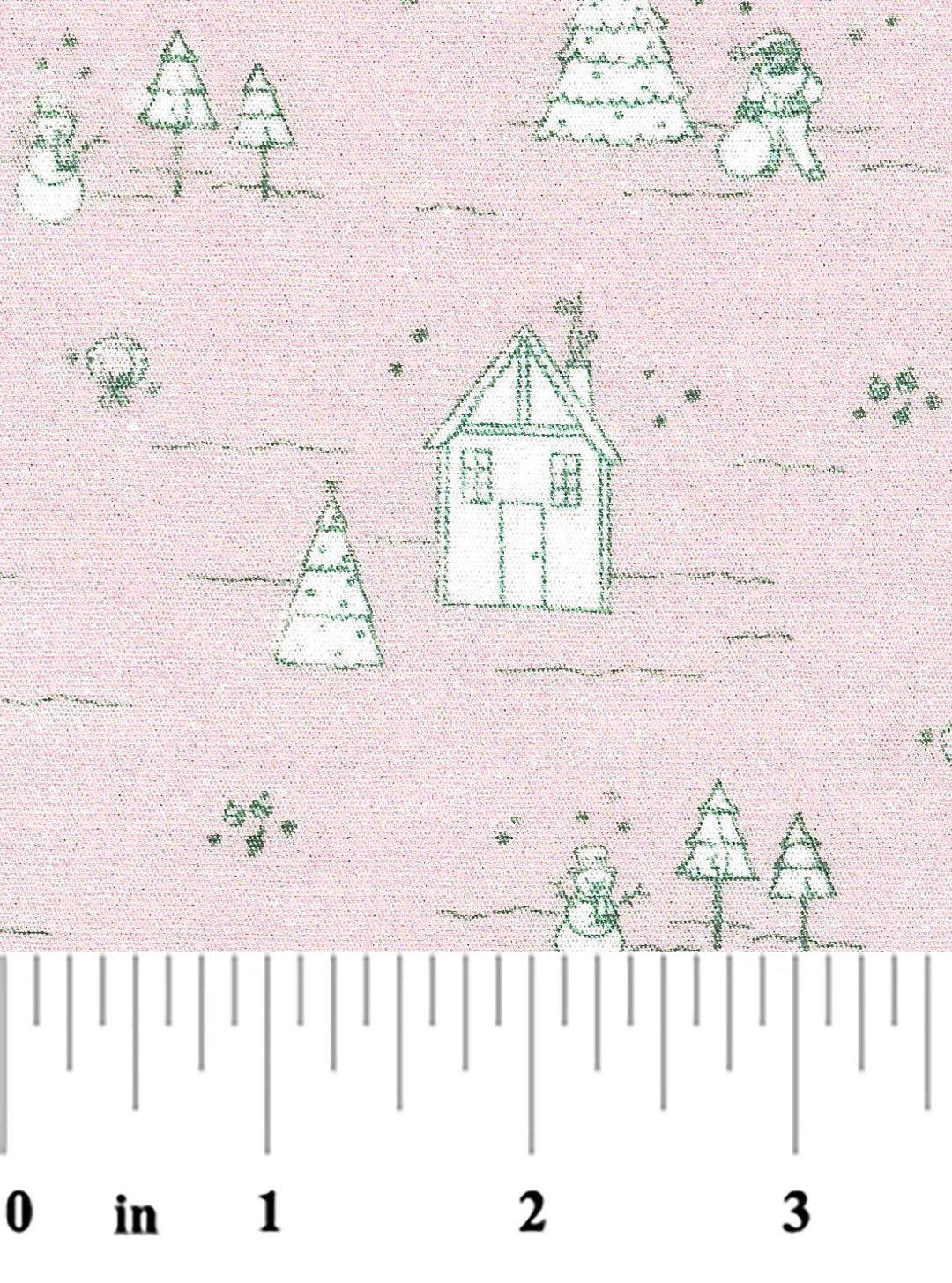 Fabric with Christmas-themed design featuring houses, trees, and snowmen on a pink background, measured with a ruler.