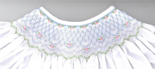 Smocking plate with sweet geometric design. 7.5 rows of smocking on a bishop.