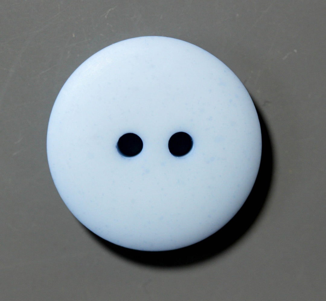 Round blue button with 2 holes on a gray background