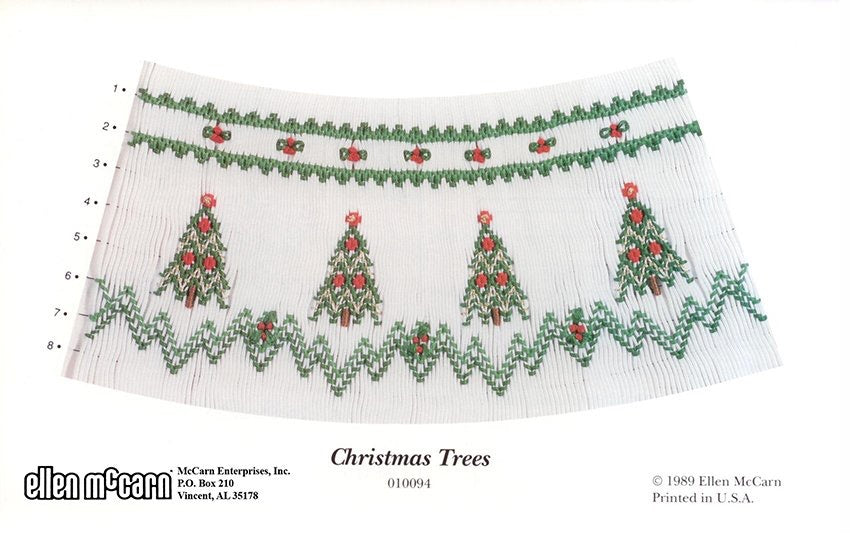 geometric smocking design smocked in green red gold and brown featuring Christmas trees on white pleated fabric