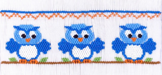 Smocking plate with three owls. 7 1/2 rows of smocking on a yoke.