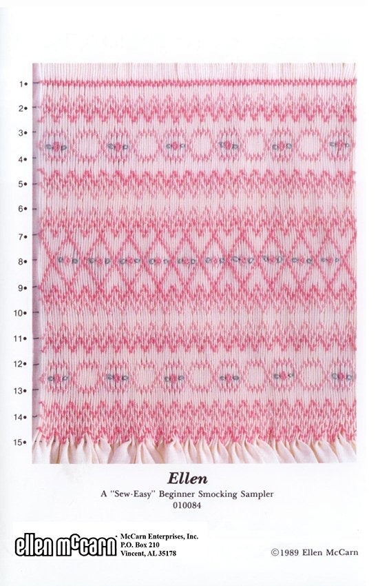 geometric smocking design smocked in pink and green on light pink pleated fabric