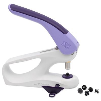White and purple tool with attachments on a white background