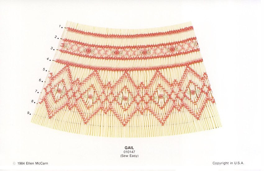 geometric smocking design in rose pink on cream pleated fabric