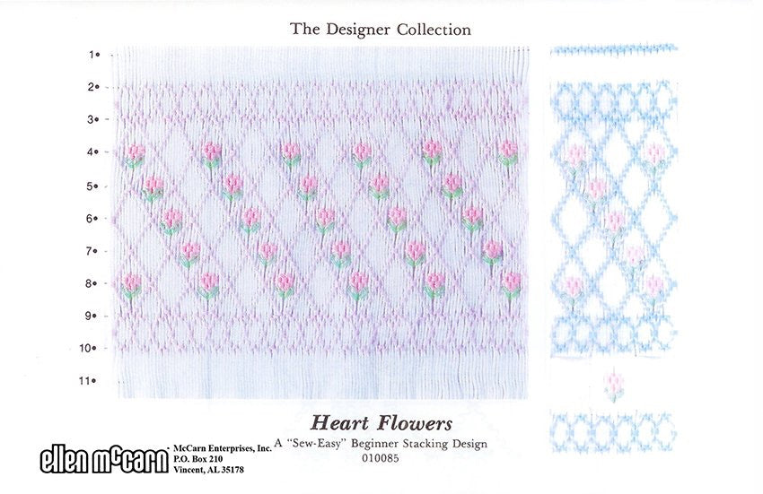 geometric smocking design smocked in pinks and green on white pleated fabric