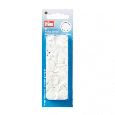 Package of white press studs with Prym branding on a white background