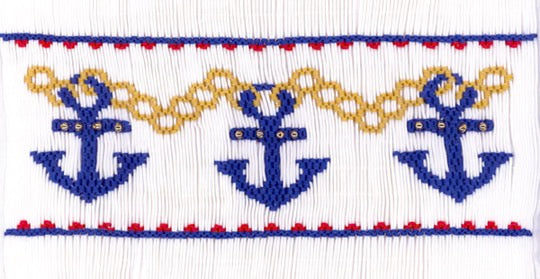 Smocking plate with anchors connected with chains. 8 1/2 rows of smocking on a yoke.