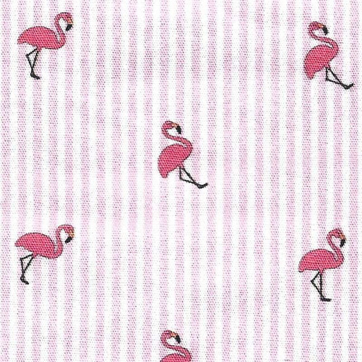 tiny flamingos on pink and white striped fabric