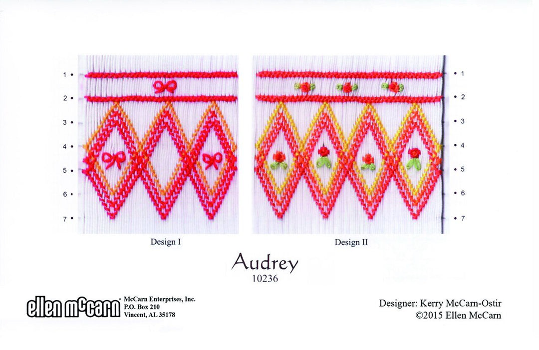 white pleated fabric smocked in bright pink, orange, yellow and accented with green leaves.