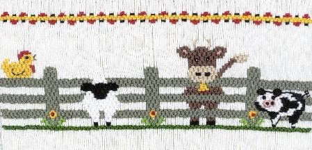 Smocking plate with a farm scene including a chicken, sheep, cow, and pig. 8 rows of smocking on a yoke.