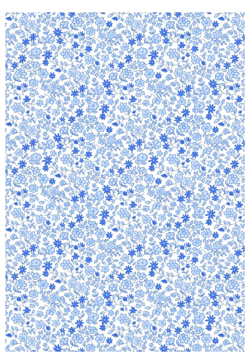Floral pattern with small blue flowers on a white background