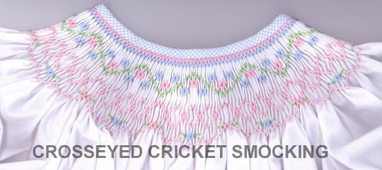 Smocking plate with a geometric floral design. 6.5 rows of smocking on a bishop.