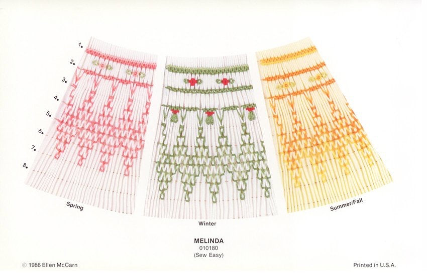 geometric smocking plate smocked in pink green and yellow on white pleated fabric