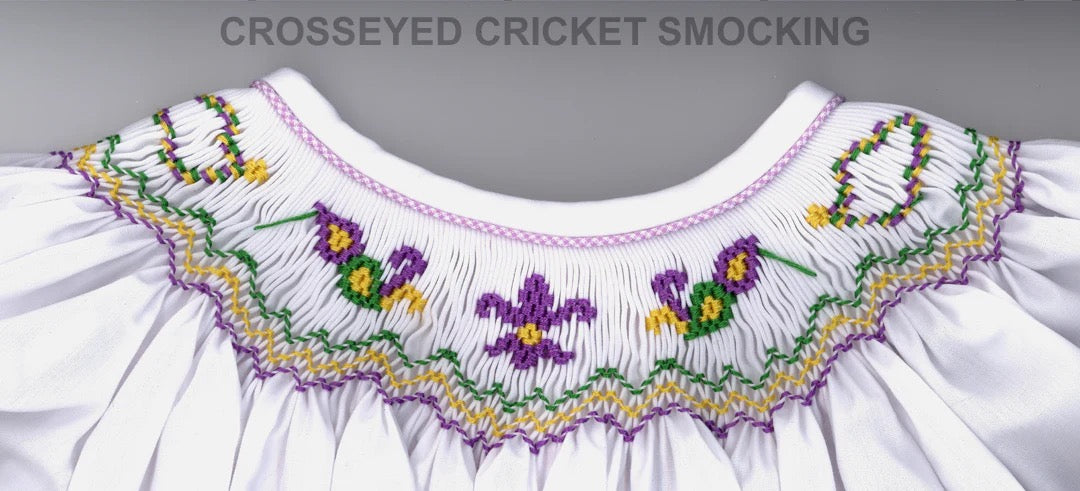 Bishop smocking plate with Mardi Gras images. 