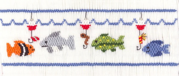 Smocking plate with four different fish and three fishing hooks with bait. 7 rows of smocking on a yoke.