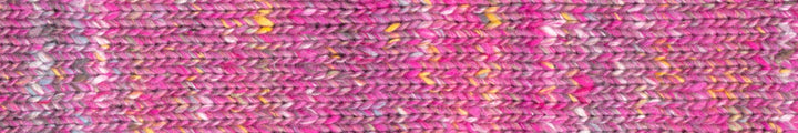 yarn in shades of pink with accents of yellow and white