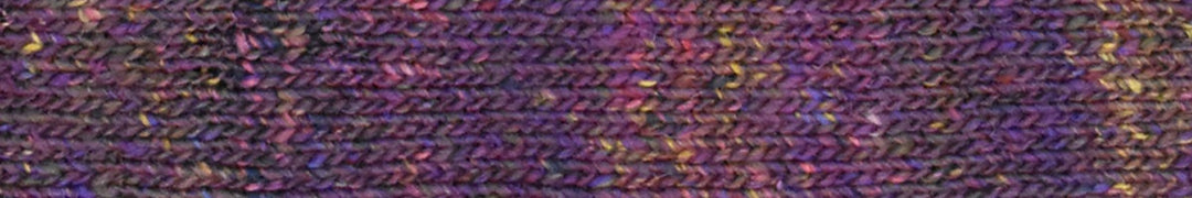 purple yarn with accents yellow, pink, and blue