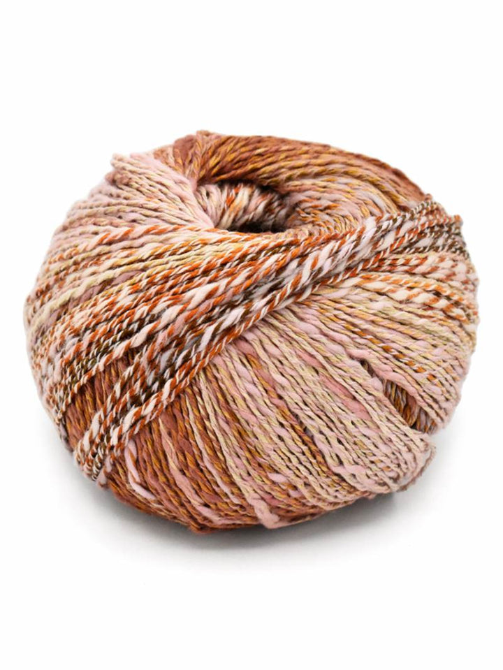 Marmel Yarn from Ella Rae. In shades of tans, browns, and a hint of pink