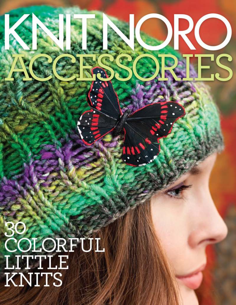 Knitted hat with butterfly accessory and text about colorful knits