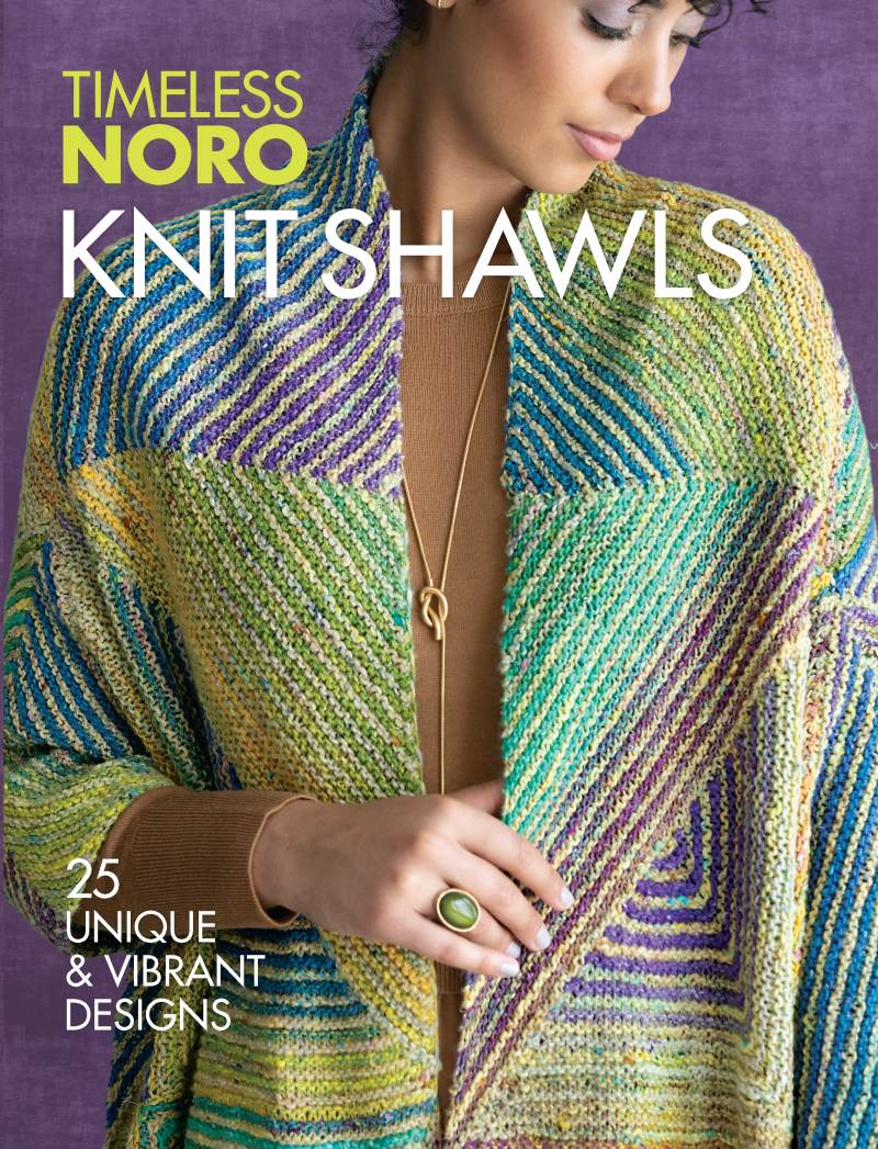 Book cover of 'Timeless Noro Knit Shawls' with a woman wearing a colorful knit shawl against a purple background.