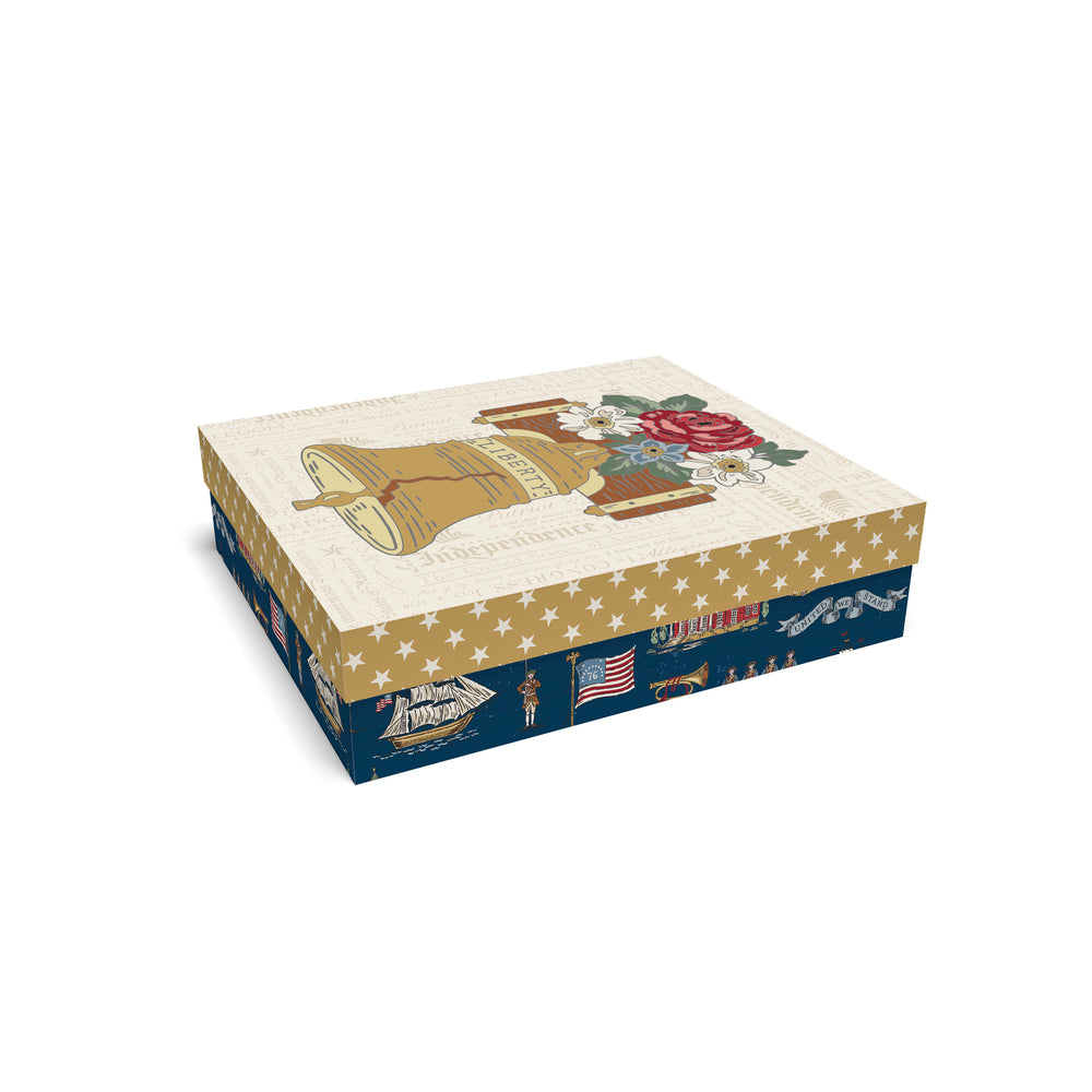 Decorative box with a design of a bell and stars on a white background